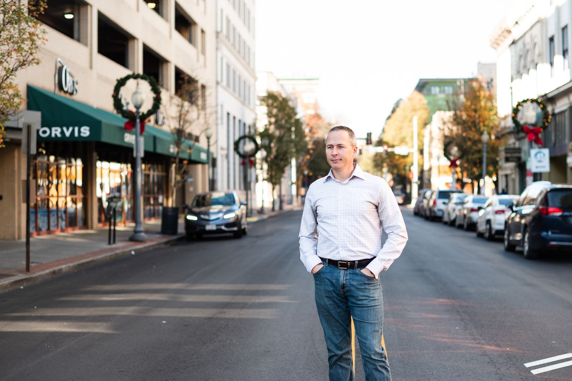 Whitney Sewell standing in the middle of a downtown street